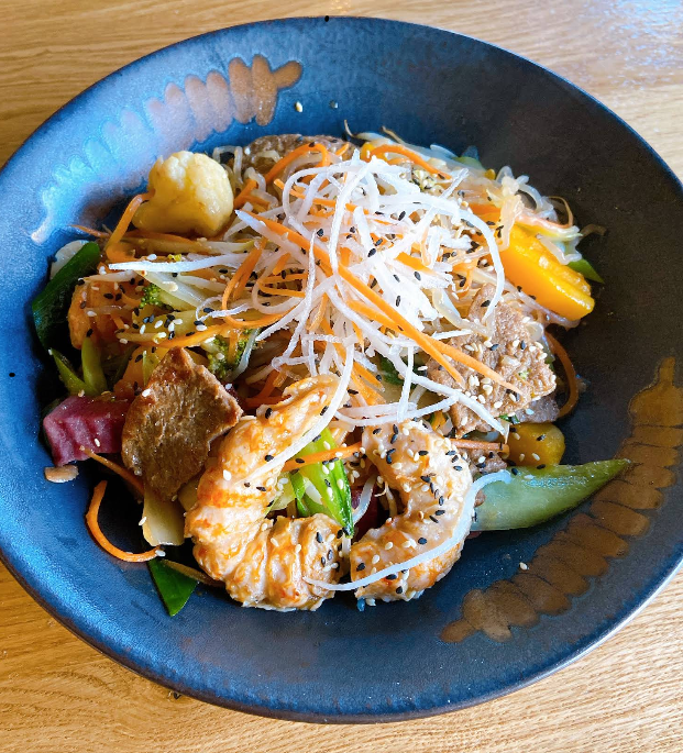 Colourful Super Bowl with glass noodles, vegan beef, vegan chicken and vegetables